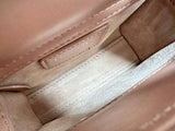 Dior mini handbag in red-brown lambskin.