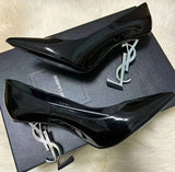 This shoe is a luxurious high heel from Saint Laurent (YSL)