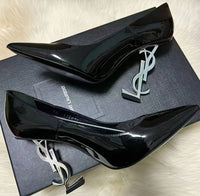 This shoe is a luxurious high heel from Saint Laurent (YSL)