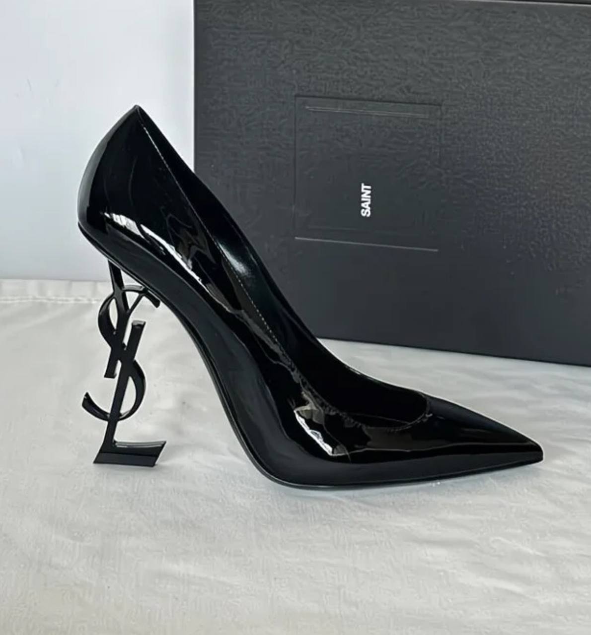 This shoe is a luxurious high heel from Saint Laurent (YSL)