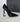 This shoe is a luxurious high heel from Saint Laurent (YSL)