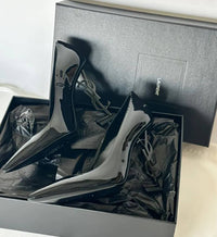 This shoe is a luxurious high heel from Saint Laurent (YSL)