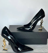 This shoe is a luxurious high heel from Saint Laurent (YSL)