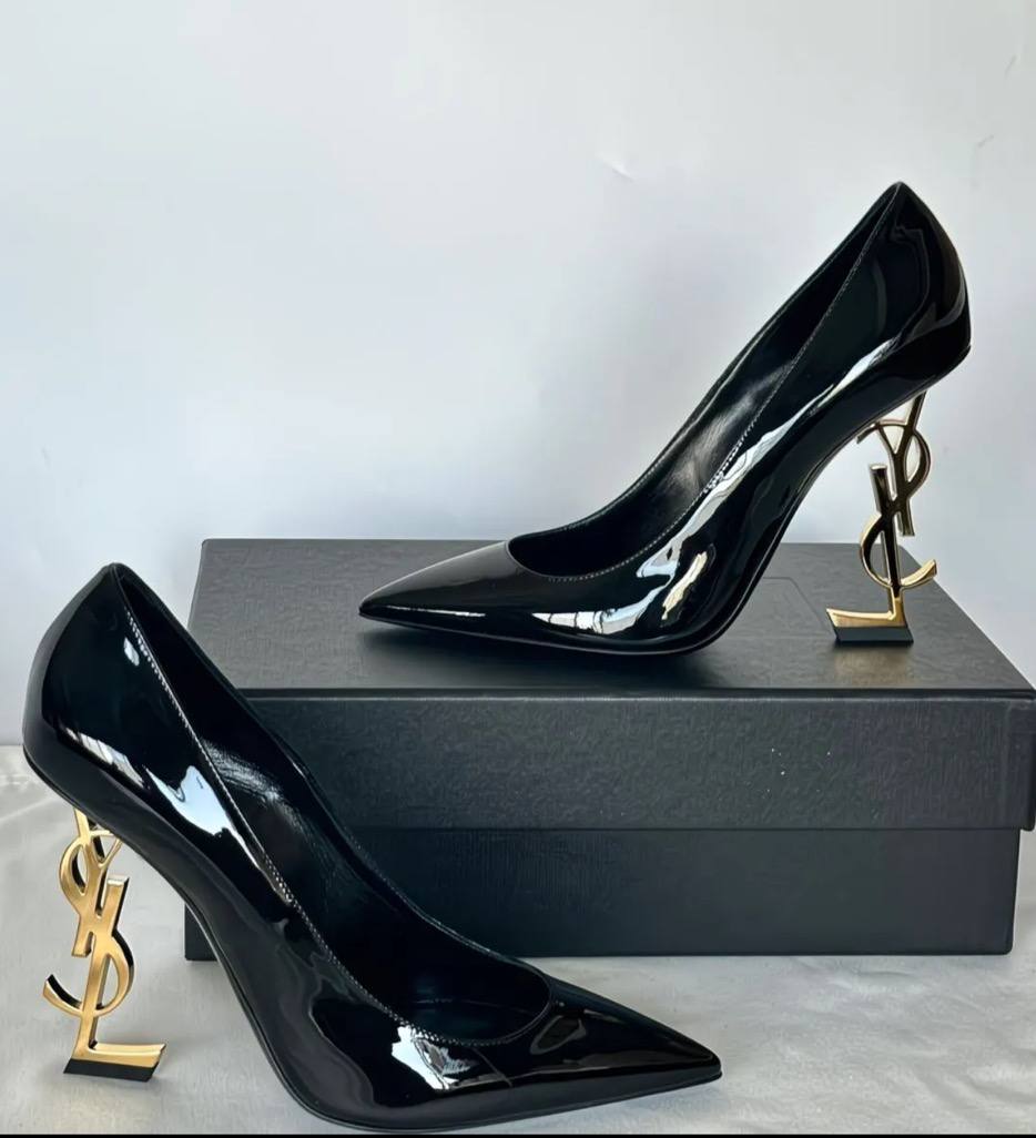 This shoe is a luxurious high heel from Saint Laurent (YSL)