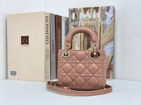 Dior mini handbag in red-brown lambskin.