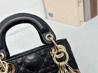 Dior mini handbag in Black-Gold lambskin.