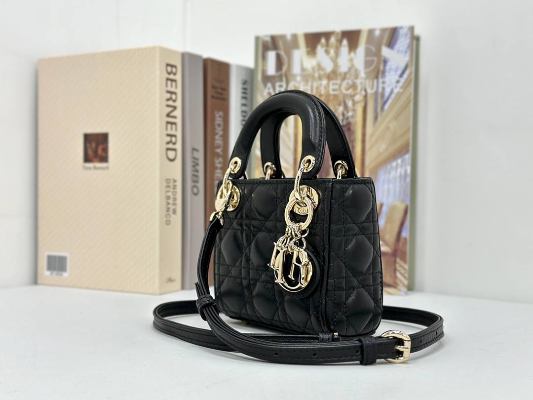 Dior mini handbag in Black-Gold lambskin.
