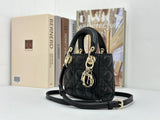 Dior mini handbag in Black-Gold lambskin.