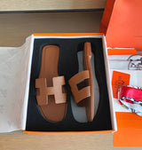 Spot Hermes leather H light brown flat slippers with matching light brown stitching – stylish women’s sandals